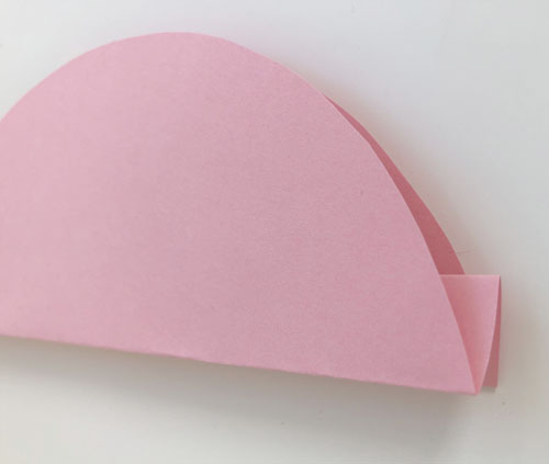 Gefaltetes rosa Papier